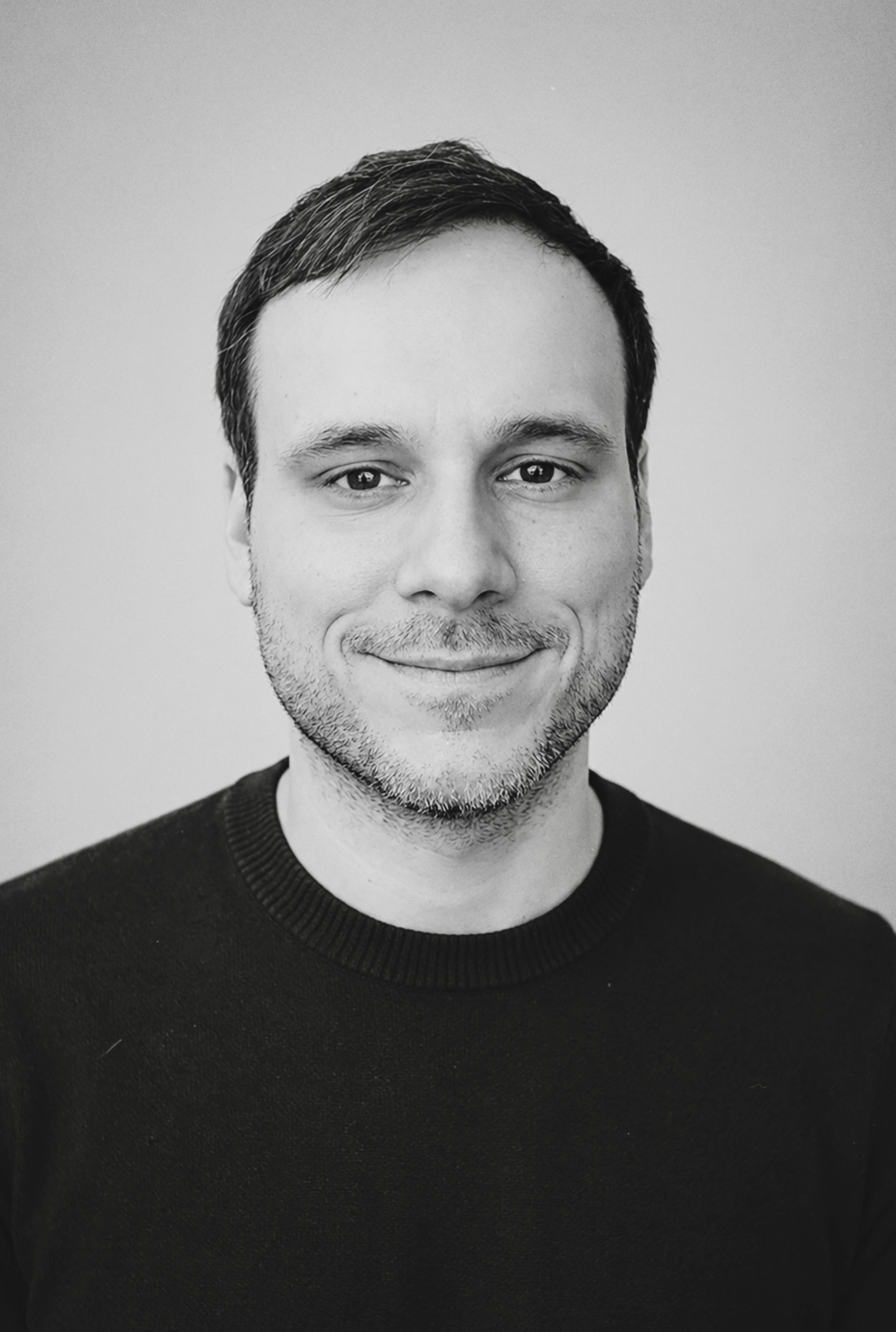 Carlos Ferrer, black-and-white portrait, looking straight into the lens